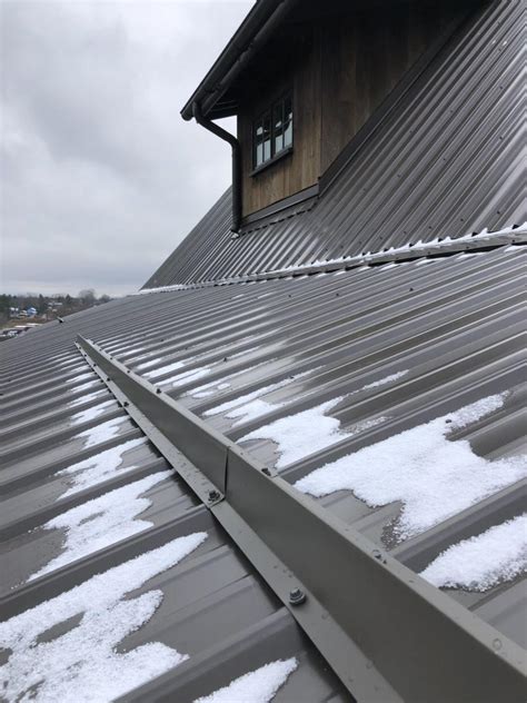 snowbreak|snow breaks for metal roof.